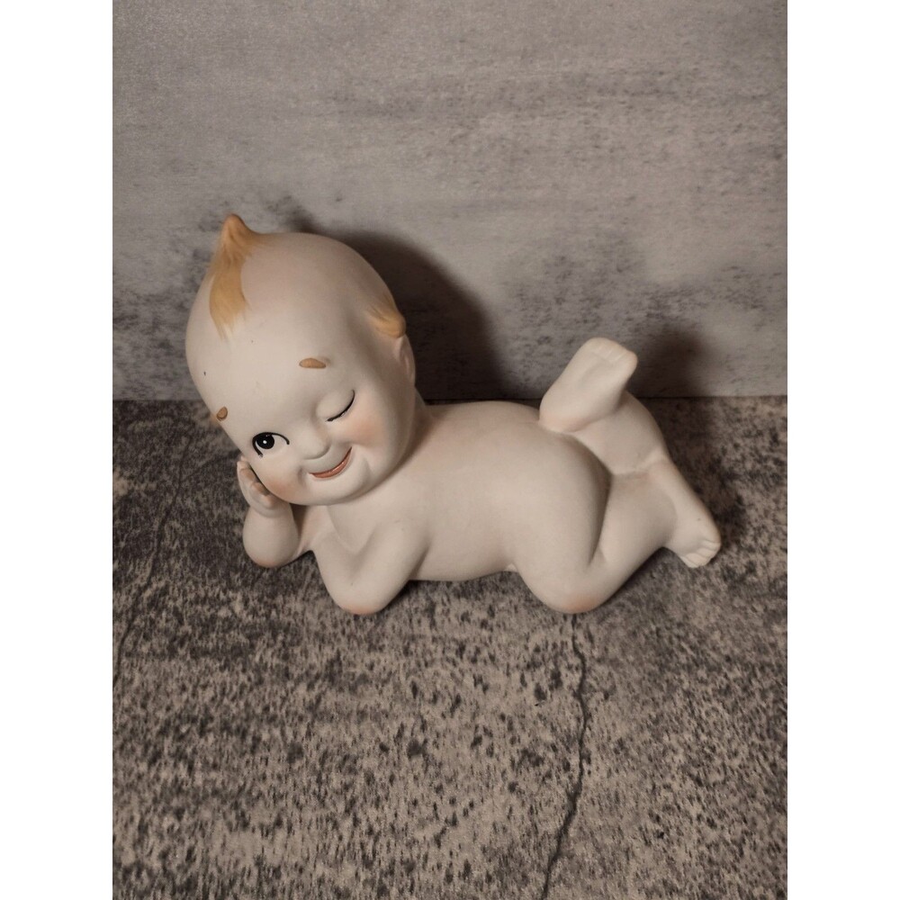 VINTAGE LEFTON KEWPIE BISQUE PIANO BABY figurine winking about 5" long